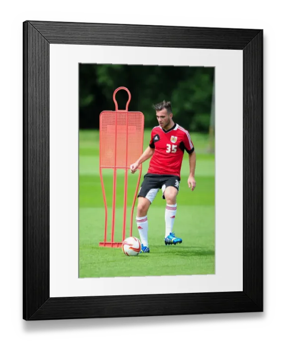Framed Print : Bristol City's Mitch Brundle Kicks Off Pre-Season Training Framed Print : Bristol City's Mitch Brundle Kicks Off Pre-Season Training