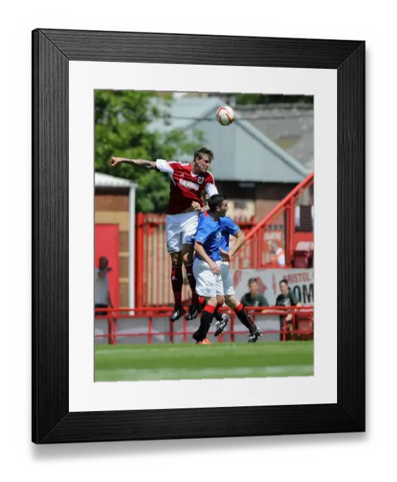 Framed Print : Intense Aerial Clash: Aden Flint vs Nicky Clark, Bristol City vs Glasgow Rangers Framed Print : Intense Aerial Clash: Aden Flint vs Nicky Clark, Bristol City vs Glasgow Rangers