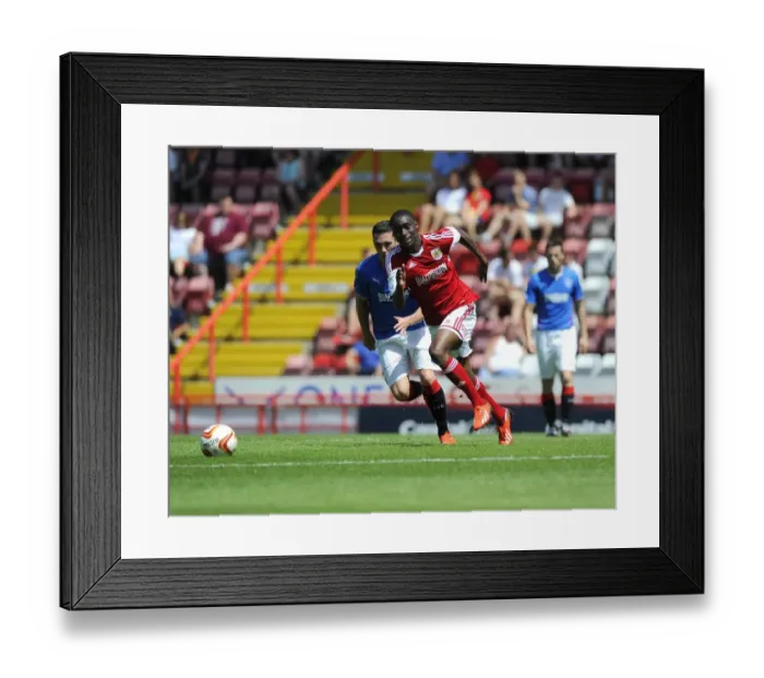 Framed Print : Jordan Wynter Charges Forward in Pre-Season Clash: Bristol City vs Glasgow Rangers Framed Print : Jordan Wynter Charges Forward in Pre-Season Clash: Bristol City vs Glasgow Rangers