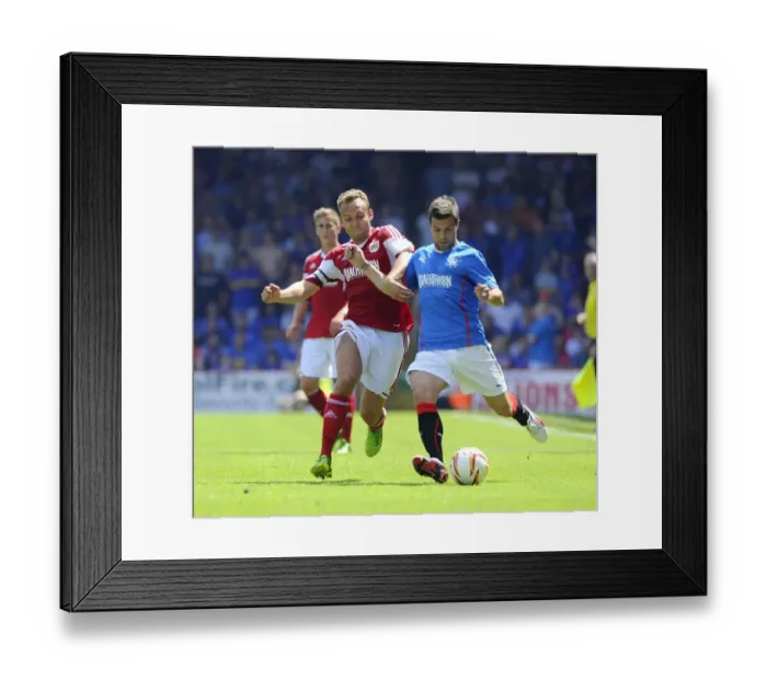 Framed Print : Intense Rivalry on the Field: Liam Kelly vs. Richard Foster Clash at Ashton Gate