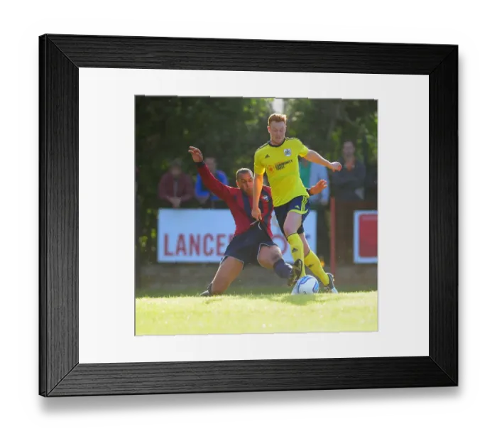 Framed Print : Bristol City's Ryan Taylor in Intense Face-off during Pre-Season Friendly Framed Print : Bristol City's Ryan Taylor in Intense Face-off during Pre-Season Friendly