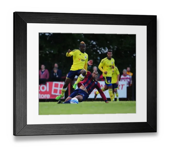 Framed Print : Bristol City's Toby Ajala Skips Past an Opponent in Pre-Season Friendly Against Ashton and Backwell United Framed Print : Bristol City's Toby Ajala Skips Past an Opponent in Pre-Season Friendly Against Ashton and Backwell United