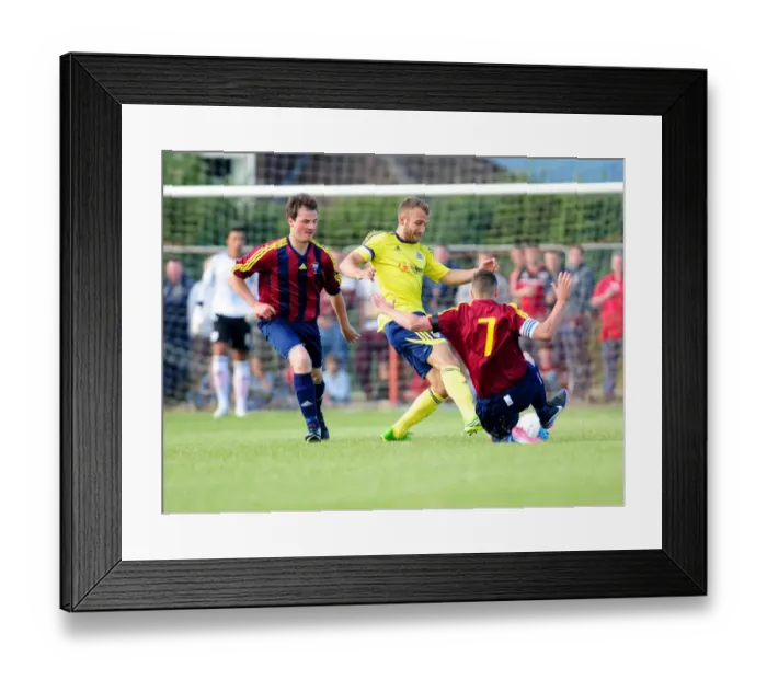 Framed Print : Bristol City's Liam Kelly Tackled in Pre-Season Friendly Against Ashton and Backwell United Framed Print : Bristol City's Liam Kelly Tackled in Pre-Season Friendly Against Ashton and Backwell United
