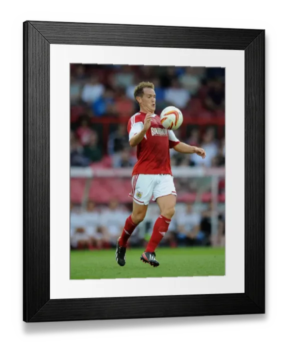 Framed Print : Neil Kilkenny in Action: Bristol City vs Reading Football Match Framed Print : Neil Kilkenny in Action: Bristol City vs Reading Football Match
