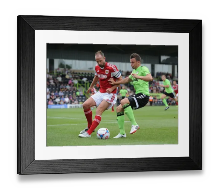 Framed Print : Bristol City's Louis Carey vs Forest Green Rovers Andrew Mangan - Preseason Clash, 2013 Framed Print : Bristol City's Louis Carey vs Forest Green Rovers Andrew Mangan - Preseason Clash, 2013