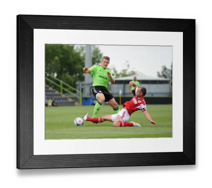 Framed Print : Bristol City's Louis Carey Tackles Yan Klukowski of Forest Green Rovers - Preseason 2013