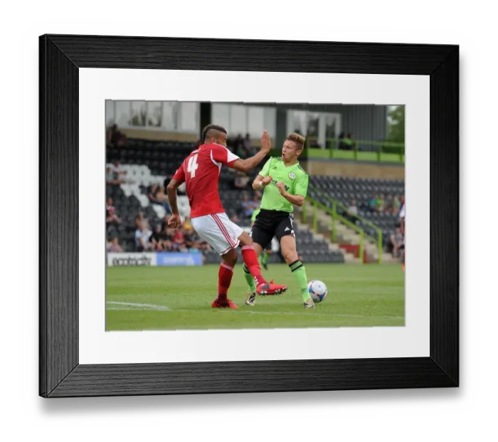 Framed Print : Bristol City's Liam Fontaine Stops Matt Taylor's Goal Attempt at Forest Green Rovers (2013)
