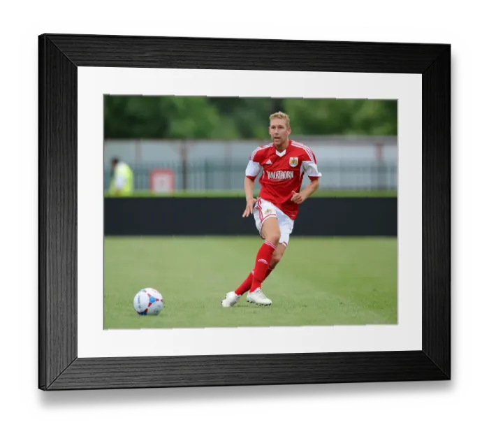 Framed Print : Scott Wagstaff of Bristol City Faces Off Against Forest Green Rovers in Preseason Clash, 2013
