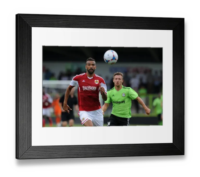 Framed Print : Bristol City's Liam Fontaine and Forest Green Rovers Matt Taylor Clash in Preseason Encounter