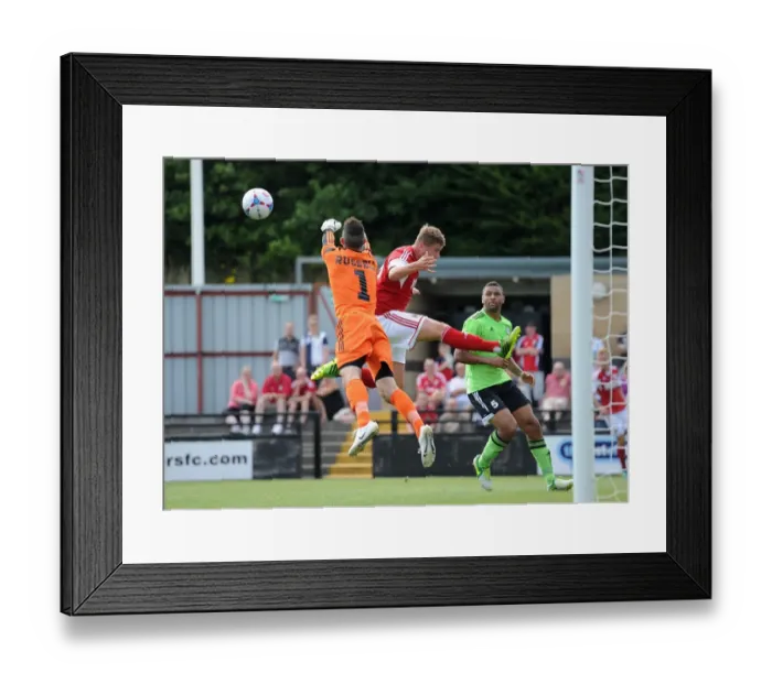 Framed Print : Forest Green Rovers Sam Russell Clears from Steven Davis in Preseason Clash vs. Bristol City Framed Print : Forest Green Rovers Sam Russell Clears from Steven Davis in Preseason Clash vs. Bristol City