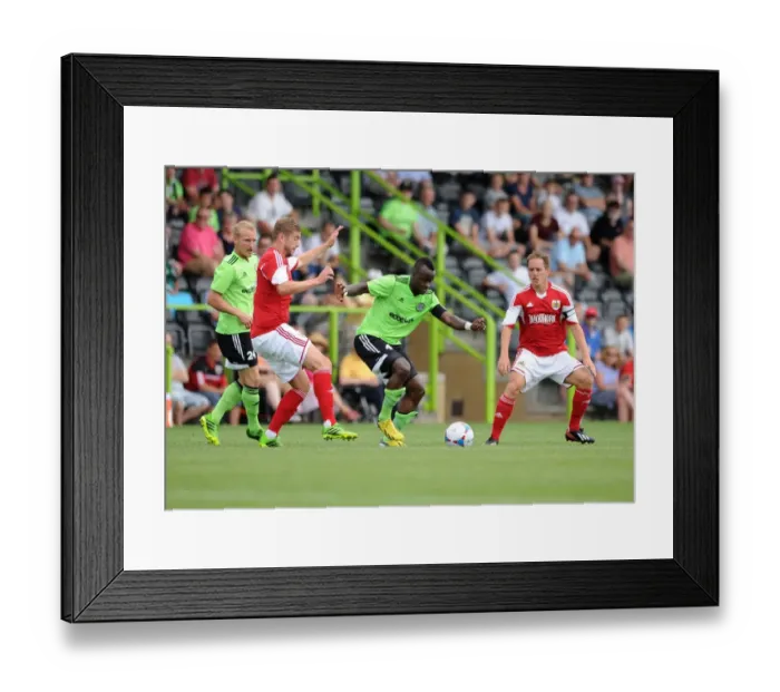 Framed Print : Forest Green Rovers Alhassan Bangura Outmaneuvers Bristol City's Steven Davis in Preseason Clash