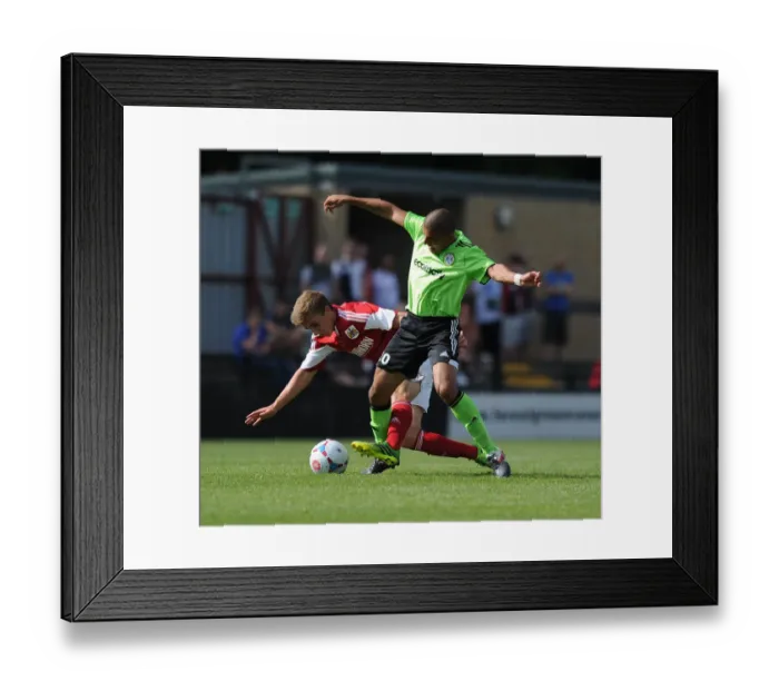 Framed Print : Forest Green Rovers Magno Viera Steals the Ball from Joe Bryan in Preseason Clash vs. Bristol City (2013)