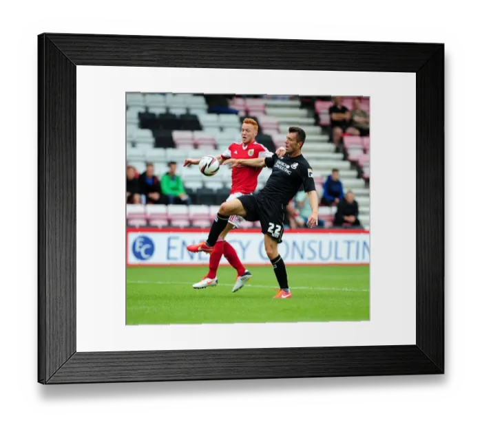 Framed Print : Bournemouth vs. Bristol City: Intense Battle for the Ball (27 / 03 / 2013)