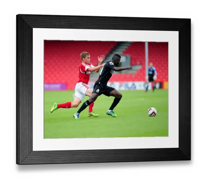 Framed Print : Bristol City's Joe Bryan Closes In on Bournemouth's Mohamed Coulibaly during Pre-Season Friendly