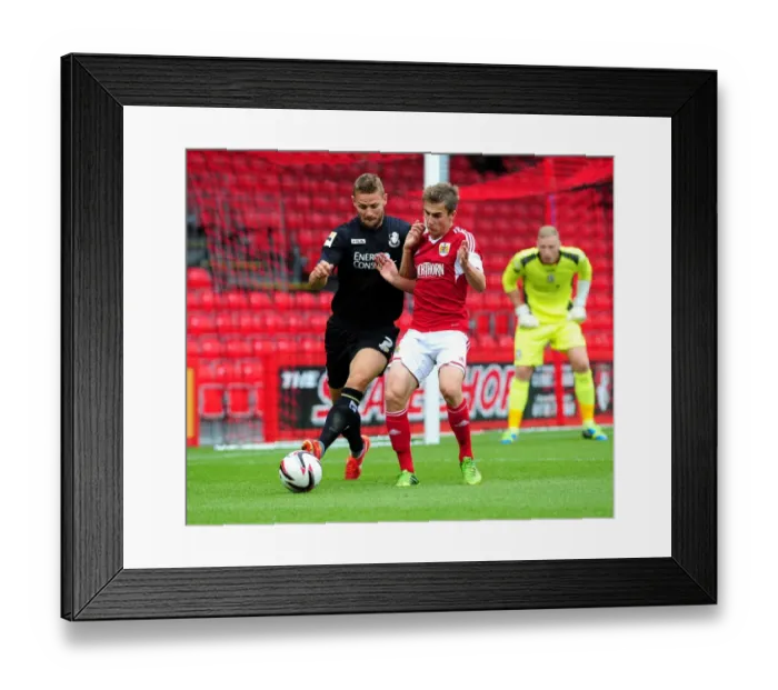 Framed Print : Bristol City vs Bournemouth: Joe Bryan vs Simon Francis - Intense Clash at Goldsands Stadium (Pre-Season Friendly)