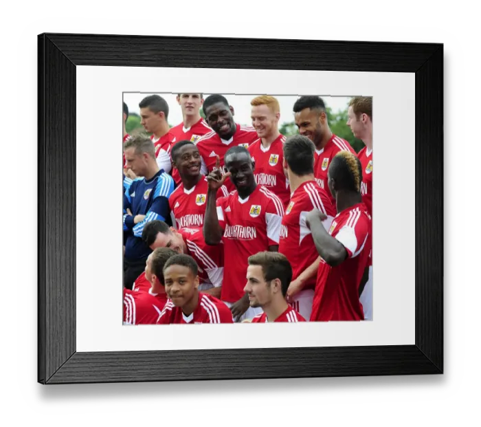Framed Print : Bristol City Football Team: Albert Adomah's Expressive Moment at the Team Photo Shoot