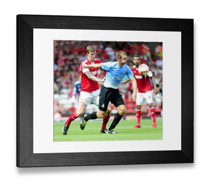 Framed Print : Aden Flint vs. James Hanson: Intense Rivalry at Ashton Gate - Bristol City vs. Bradford City, Sky Bet League One (August 2013)