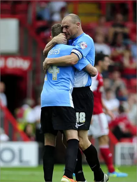 Celebrating the Goal: Jones and Yeates Rejoice with Nahki Wells after Scoring for Bradford City against Bristol City (August 3, 2013)