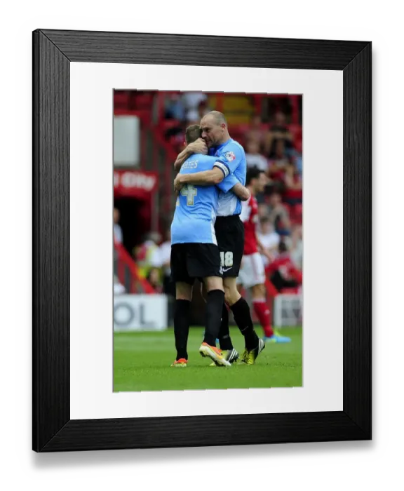 Framed Print : Celebrating the Goal: Jones and Yeates Rejoice with Nahki Wells after Scoring for Bradford City against Bristol City (August 3, 2013)