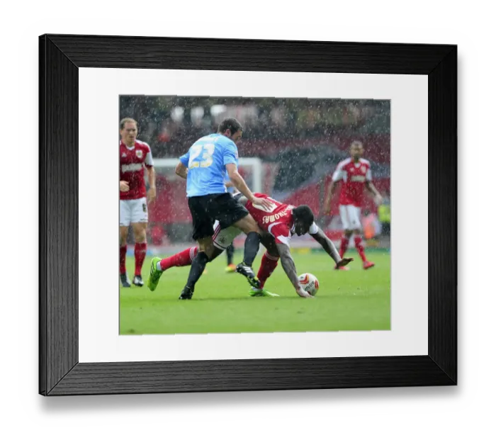 Framed Print : Bristol City's Jay Emmanuel-Thomas Fouled by Rory McArdle during Bradford City Match