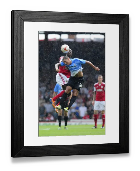 Framed Print : Bristol City vs Bradford City: Intense Header Battle Between Jordan Wynter and Nathan Doyle Framed Print : Bristol City vs Bradford City: Intense Header Battle Between Jordan Wynter and Nathan Doyle