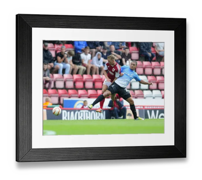 Framed Print : Bristol City vs Bradford City: Wagstaff Tackled by Doyle Framed Print : Bristol City vs Bradford City: Wagstaff Tackled by Doyle