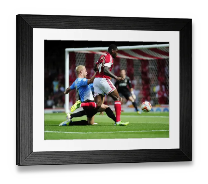 Framed Print : Slick Moves: Jay Emmanuel-Thomas Dodges Andrew Davies at Ashton Gate