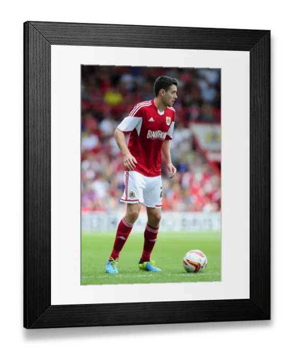 Framed Print : Brendan Moloney vs Bradford City: Intense Face-off in the Sky Bet League One Clash at Ashton Gate (August 2013)