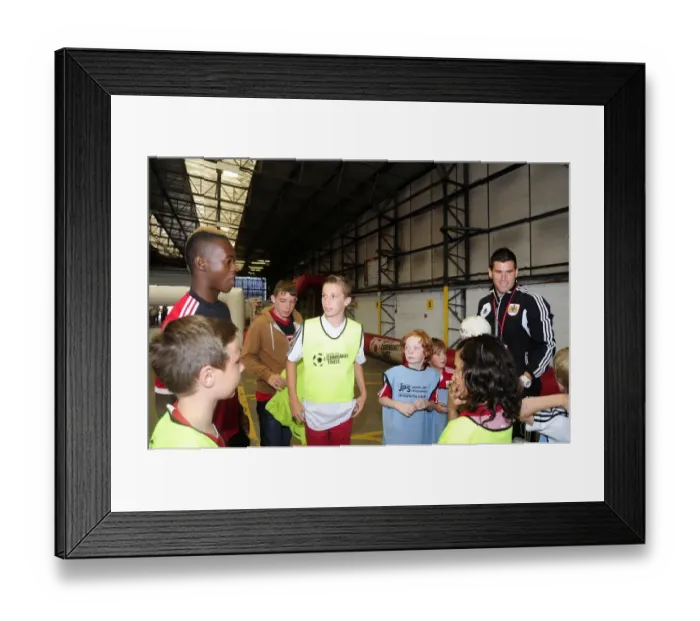 Framed Print : Bristol City's Toby Ajala Engages with Young Fans at Community Park during Bristol City V Bradford City Match, August 2013 Framed Print : Bristol City's Toby Ajala Engages with Young Fans at Community Park during Bristol City V Bradford City Match, August 2013