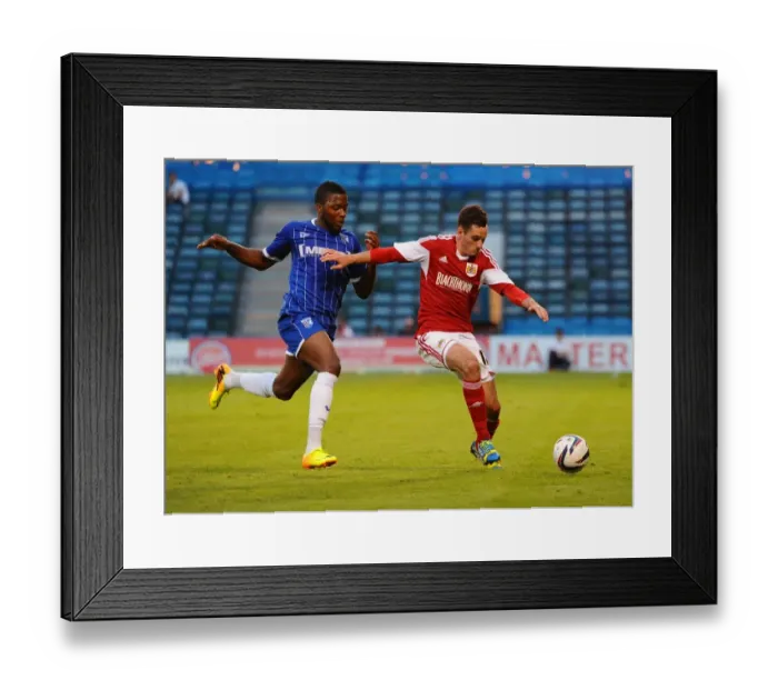 Framed Print : Bristol City's Greg Cunningham Blocks Antonio German's Shot at Priestfield Stadium, 2013
