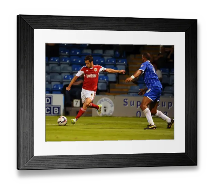 Framed Print : Bristol City's Sam Baldock Attempts Cross Against Gillingham in Capital One Cup Clash Framed Print : Bristol City's Sam Baldock Attempts Cross Against Gillingham in Capital One Cup Clash