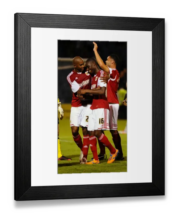 Framed Print : Bristol City Celebrate First Round Cup Win: Jordan Wynter and Marvin Elliott Embrace in Triumph