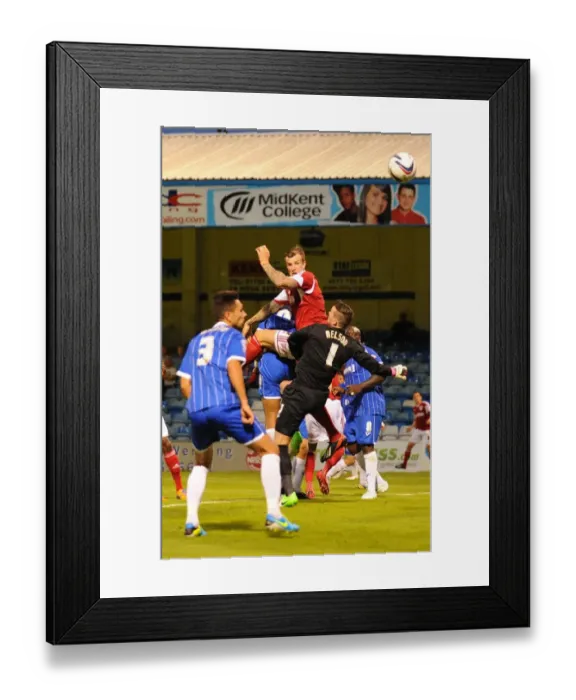 Framed Print : Aden Flint's Close Call: Bristol City's Defender Leaps High but Heads Wide vs. Gillingham Framed Print : Aden Flint's Close Call: Bristol City's Defender Leaps High but Heads Wide vs. Gillingham