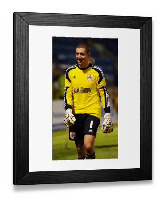 Framed Print : Frank Fielding's Heroics: Bristol City's Goalkeeper Stuns Gillingham in Capital One Cup