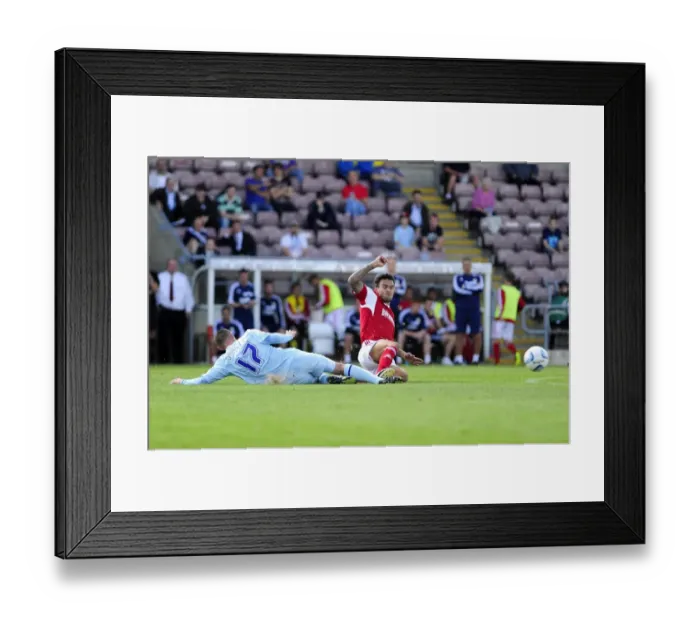 Framed Print : Maron Pack vs. Billy Daniels: Intense Rivalry in Coventry vs. Bristol City Football Clash