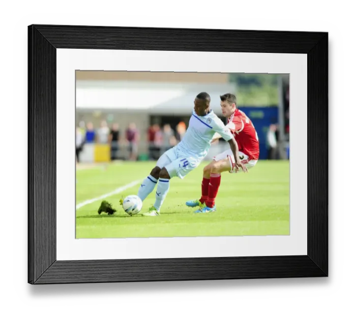 Framed Print : Bristol City's Brendan Moloney Closes In on Coventry's Franck Moussa in Sky Bet League One Clash Framed Print : Bristol City's Brendan Moloney Closes In on Coventry's Franck Moussa in Sky Bet League One Clash