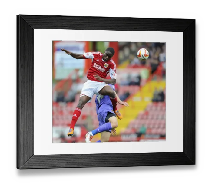 Framed Print : Bristol City vs. Wolves: Jordan Wynter's Aerial Battle Framed Print : Bristol City vs. Wolves: Jordan Wynter's Aerial Battle