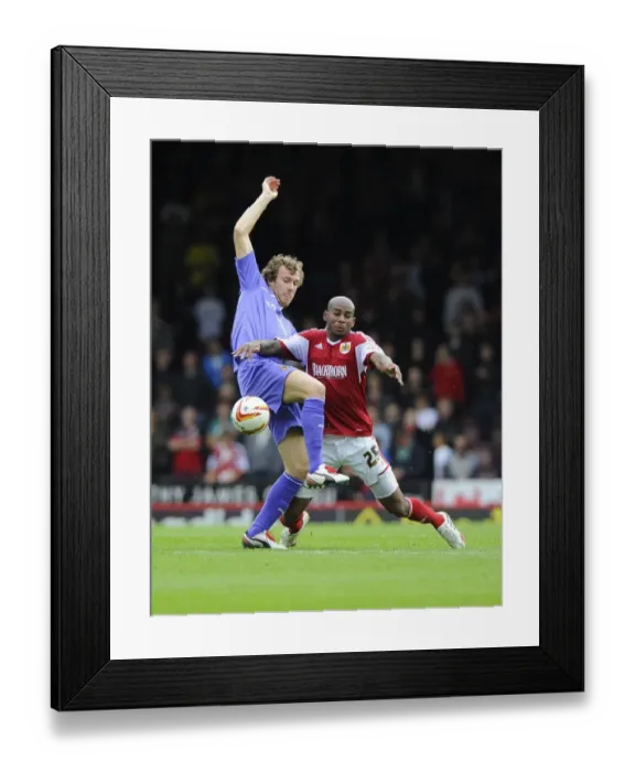 Framed Print : Battling for Supremacy: Marvin Elliott vs. Kevin McDonald in Bristol City vs. Wolves Football Match Framed Print : Battling for Supremacy: Marvin Elliott vs. Kevin McDonald in Bristol City vs. Wolves Football Match