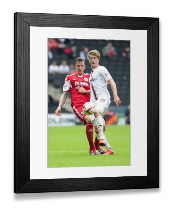 Framed Print : Aden Flint of Bristol City Closes In on Patrick Bamford of Milton Keynes Dons
