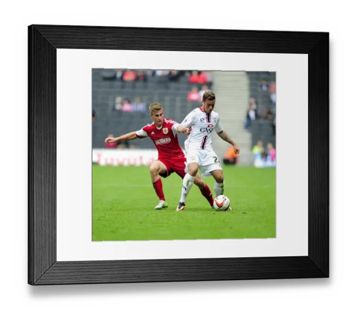 Framed Print : Bristol City vs Milton Keynes Dons: A Football Rivalry - Clash between Bryan and Carruthers
