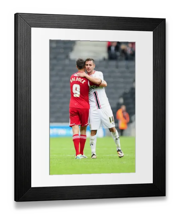 Framed Print : Brothers in Football: Sam and George Baldock's Emotional Reunion after Milton Keynes Dons vs. Bristol City Framed Print : Brothers in Football: Sam and George Baldock's Emotional Reunion after Milton Keynes Dons vs. Bristol City