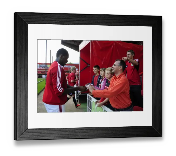 Framed Print : Bristol City's Jay Emmanuel-Thomas Signs Autographs at Ashton Gate after Bristol City V Crystal Palace, Capital One Cup Match Framed Print : Bristol City's Jay Emmanuel-Thomas Signs Autographs at Ashton Gate after Bristol City V Crystal Palace, Capital One Cup Match