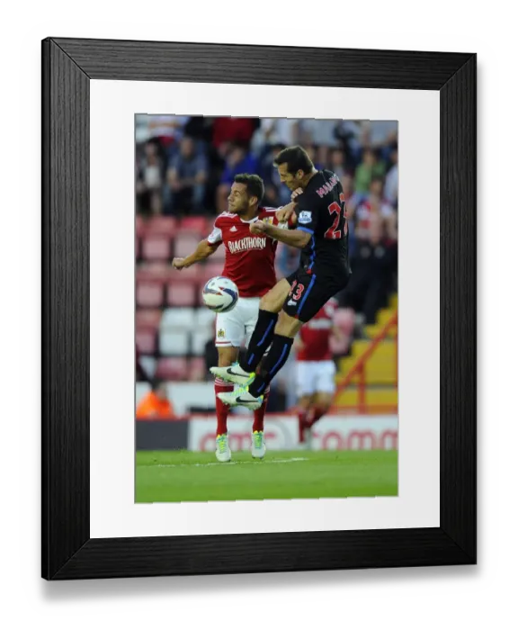 Framed Print : Battling Rivals: Sam Baldock vs. Florian Marange - Football Showdown at Ashton Gate