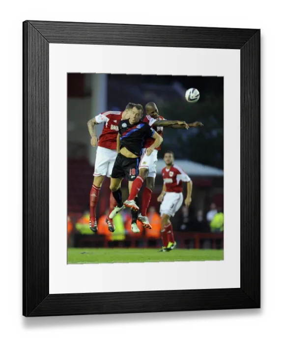 Framed Print : Bristol City vs Crystal Palace: Intense Aerial Battle Between Marvin Elliott and Aaron Wilbraham Framed Print : Bristol City vs Crystal Palace: Intense Aerial Battle Between Marvin Elliott and Aaron Wilbraham