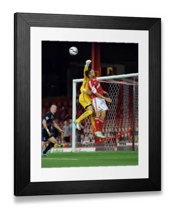 Framed Print : Neil Alexander vs Sam Baldock: Intense Moment at Ashton Gate - Bristol City vs Crystal Palace, 2013