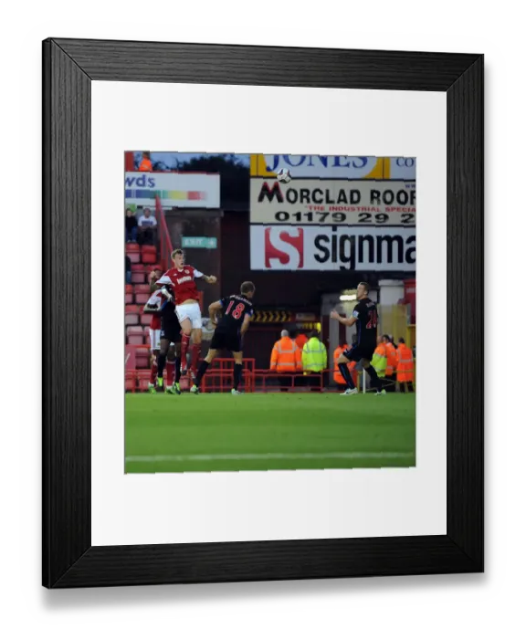 Framed Print : Aden Flint's Header: Bristol City vs Crystal Palace, Capital One Cup 2013