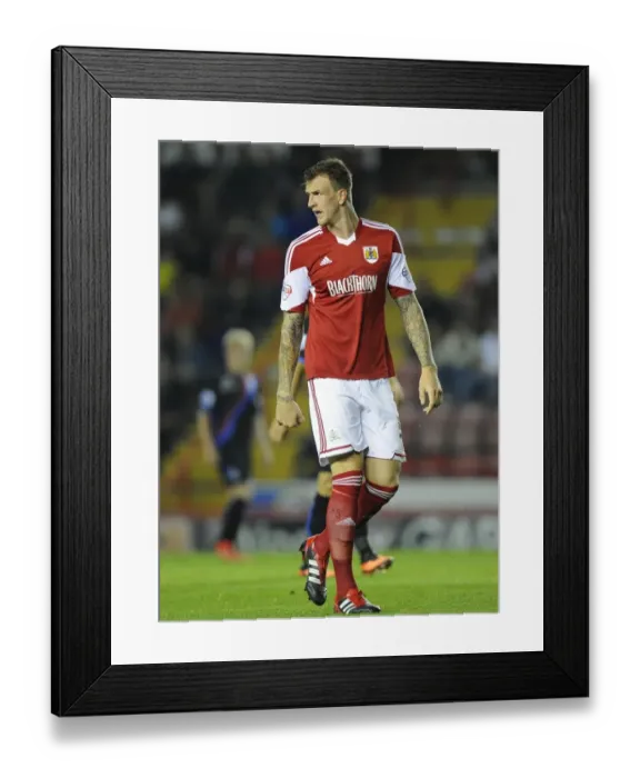 Framed Print : Aden Flint's Battle: Bristol City vs Crystal Palace in the Capital One Cup, 2013