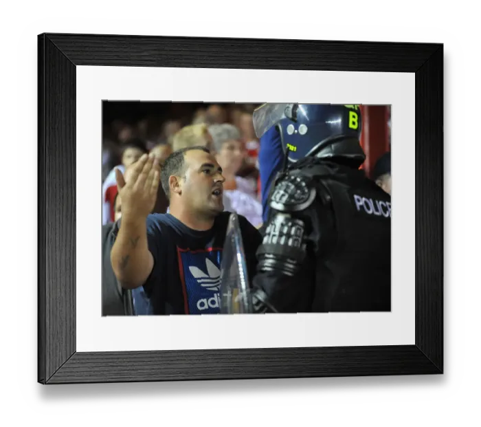 Framed Print : Bristol Derby: Fan Faces Police Confrontation at Ashton Gate (Bristol City V Bristol Rovers, Johnstone Paint Trophy 2013) Framed Print : Bristol Derby: Fan Faces Police Confrontation at Ashton Gate (Bristol City V Bristol Rovers, Johnstone Paint Trophy 2013)