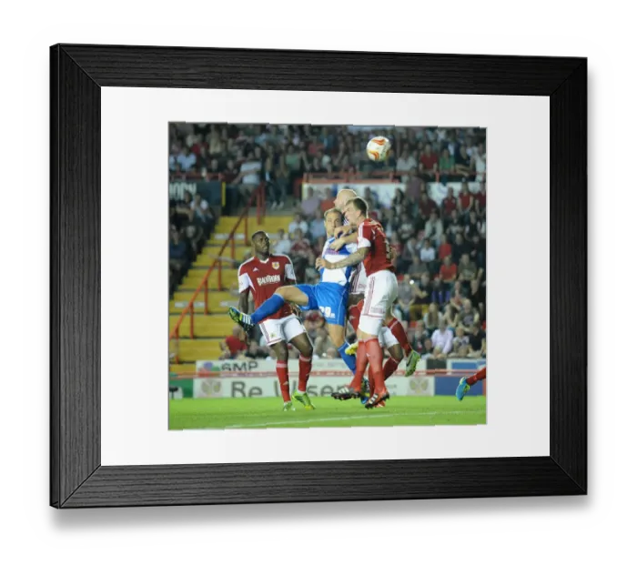 Framed Print : Bristol Derby: McChrystal Scores the Opener for Bristol City in Johnstone's Paint Trophy
