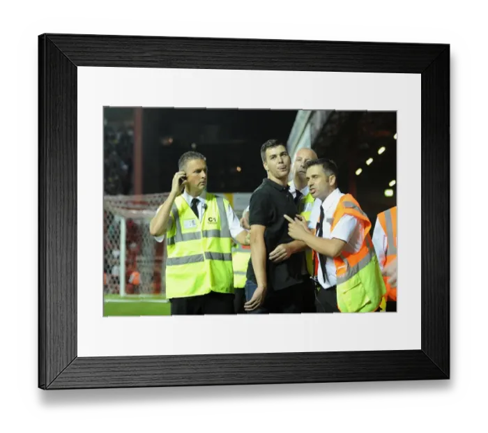 Framed Print : Bristol Derby: Tense Moment as Bristol Rovers Fan is Escorted by Stewards during Bristol City vs. Bristol Rovers (Johnstone Paint Trophy, 2013) Framed Print : Bristol Derby: Tense Moment as Bristol Rovers Fan is Escorted by Stewards during Bristol City vs. Bristol Rovers (Johnstone Paint Trophy, 2013)